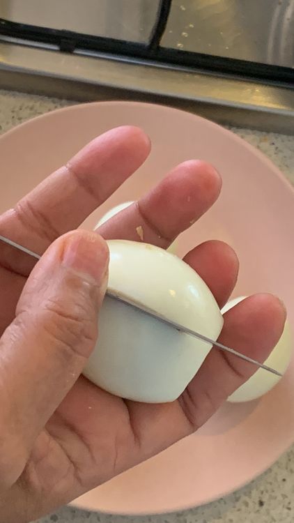 Step 1.1: Boil the eggs, peel and make cuts on them and set them aside