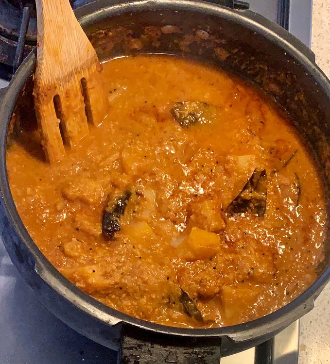 Step 1.2: Pour in the water to adjust the consistency of the curry