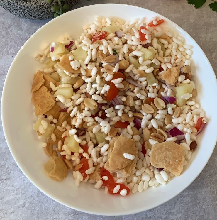 Step 1.1: Break the papdi into small pieces and add them to the bowl
