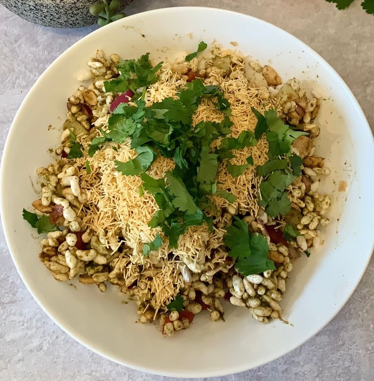 Step 1.1: Just before serving, add the sev to the bhel puri and mix