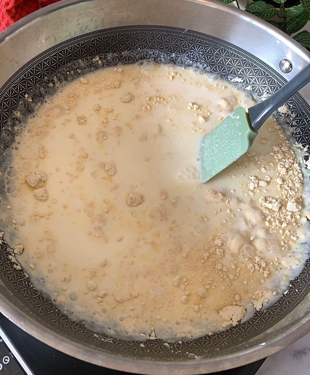 Step 3.1: Add the buttermilk gradually to the pan and mix well to avoid lumps