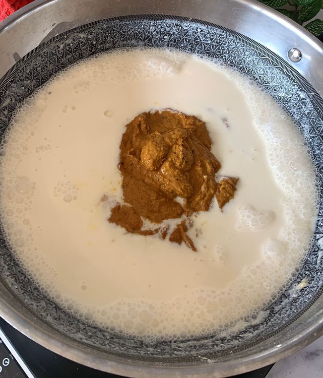 Step 3.1: Add the ground masala paste, lemon juice and reserved mutton stock and mix well