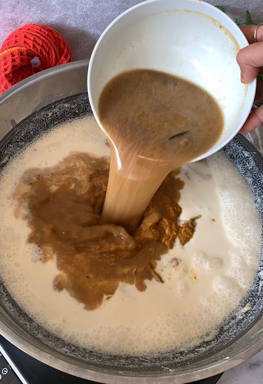Step 3.2: Add the ground masala paste, lemon juice and reserved mutton stock and mix well