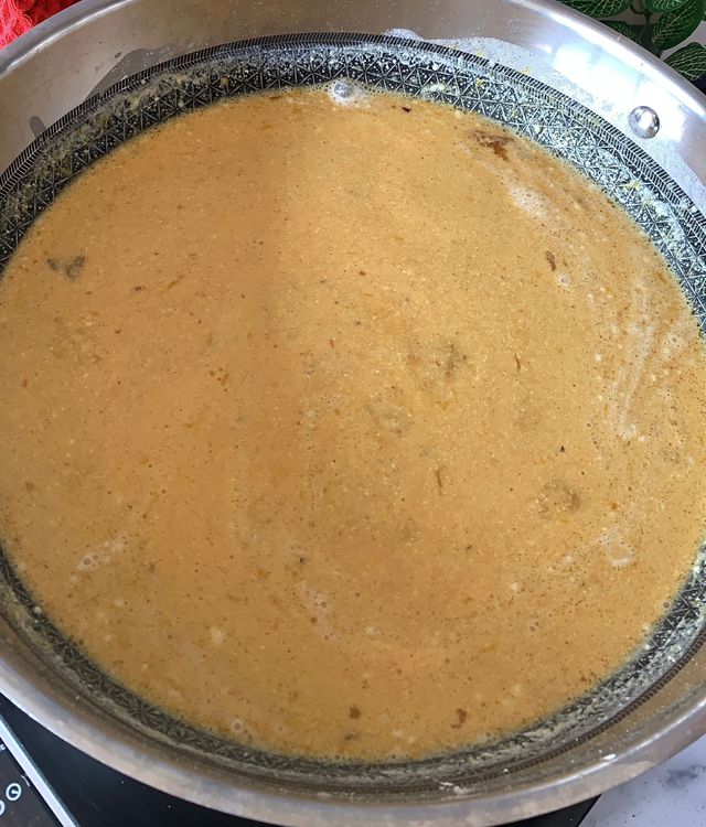 Step 3.3: Add the ground masala paste, lemon juice and reserved mutton stock and mix well