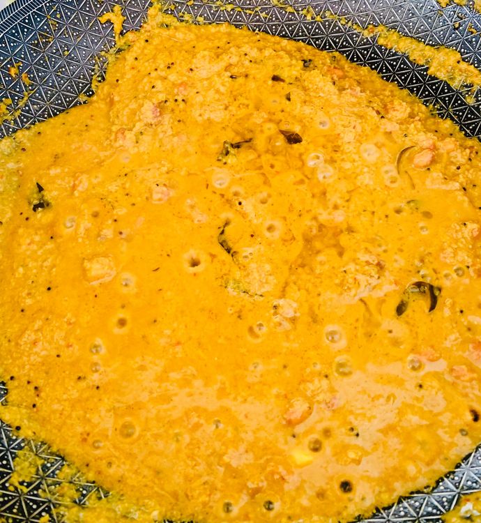 Step 1.1: Add the tamarind pulp and sugar, and cook until the oil starts separating from the gravy