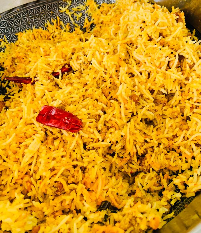 Step 1.2: Add the boiled rice, mix well, turn off the heat, and let it sit covered for a few minutes
