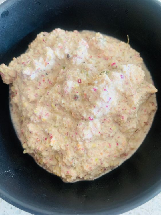 Step 1.1: Transfer the soaked mixture to a blender, adding the nutmeg powder and rose petals