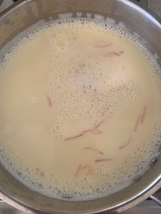 Step 2.1: Once boiling, add the sugar and the saffron infusion