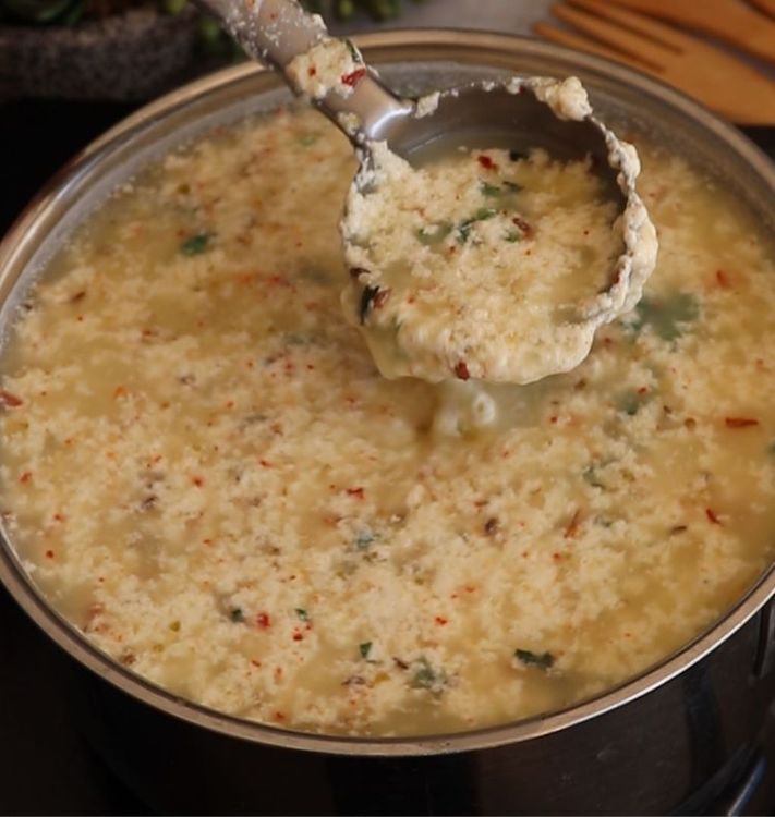 Step 1.2: Gradually stir in the vinegar-water mixture into the milk