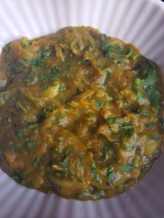 Step 1.1: Finally you add, your sliced and washed spinach leaves and allow to simmer on low heat for 45 secs to 1 minute and voila! Your sweet potato porridge is ready 😋