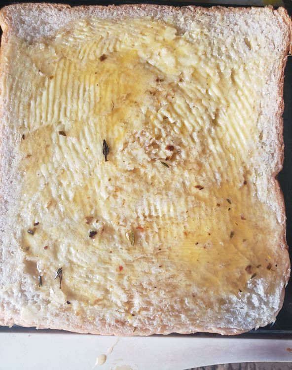 Step 3.1: Glaze the bread with the egg mix
