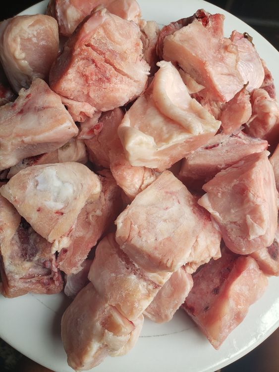 Step 1.1: Wash Chicken and place in a pot, add diced onions, 1 teaspoon black pepper, 1 ½ teaspoon salt, ½ teaspoon curry|thyme|nutmeg, 2 cubes seasoning cube,, grated ginger and garlic and one cup of water