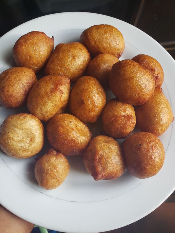 Step 2.2: Allow to fry till it's golden brown and scoop out of oil with a frying spoon and voila!