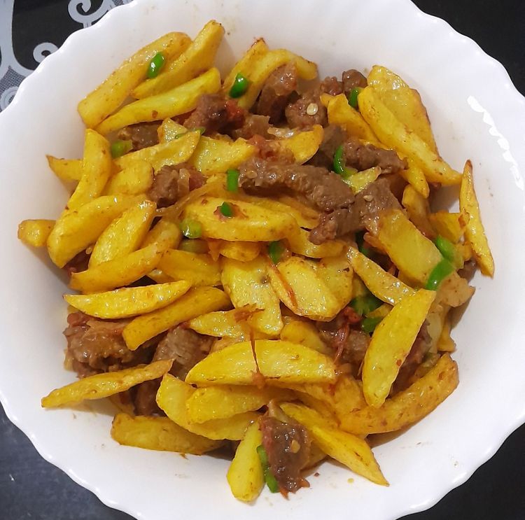Step 2.1: Pour it on the French fries in the bowl and mix
