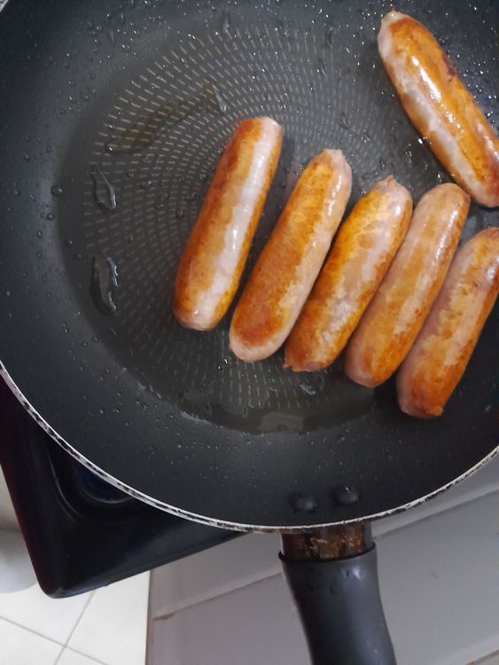 Step 1.1: Shallow fry the sausages in a pan until browned
