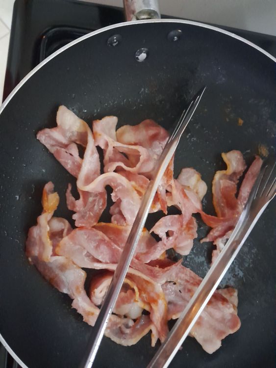 Step 1.1: Fry bacon strips to desired level of crunchiness, no oil required if using a non stick pan

