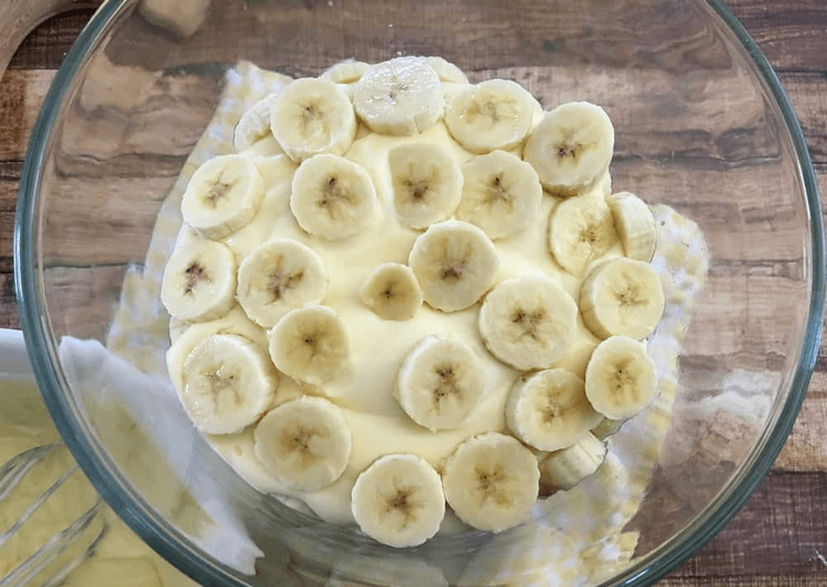 Step 2.1: Cut the pound cake into cubes and place them along the sides and center of the trifle dish