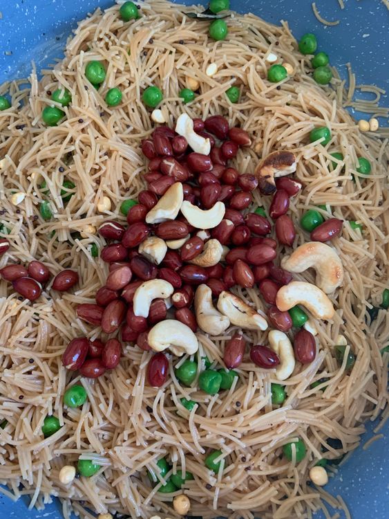 Step 3.1: Mix in the roasted peanuts, cashews, and lemon juice