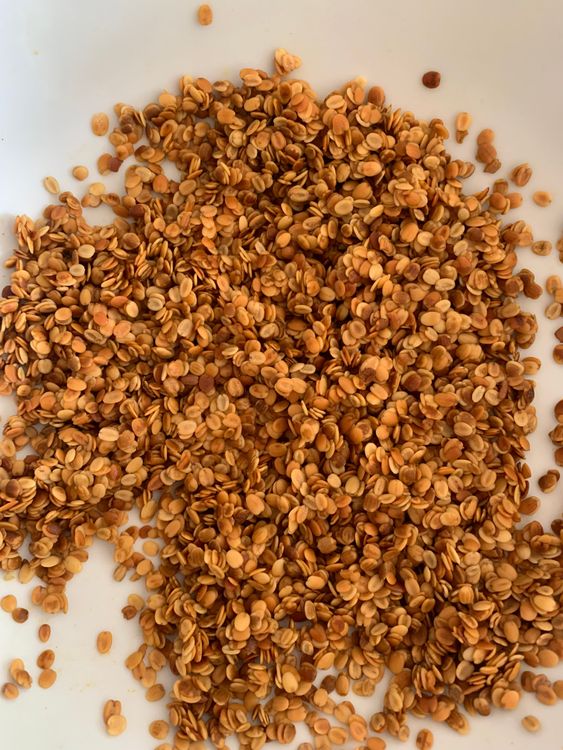 Step 2.1: In a fourth bowl, add the dhana dal and pour the remaining lemon mixture over it
