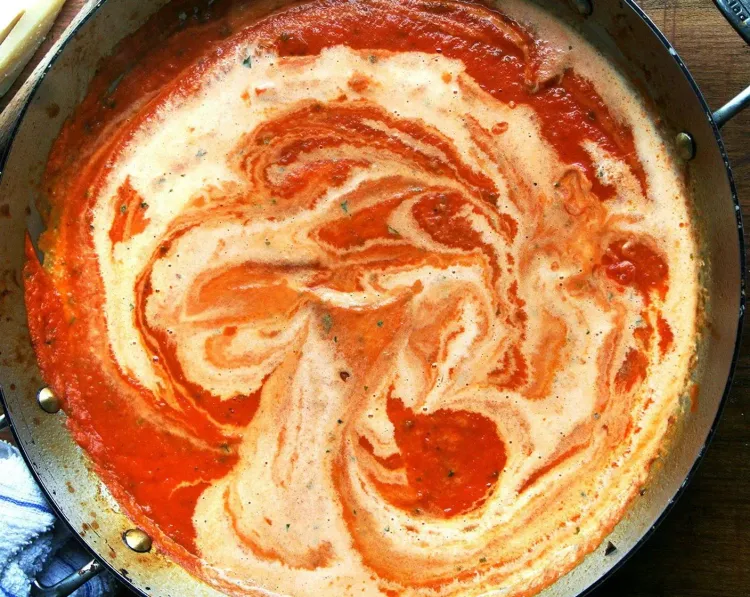 Step 1.1: Reheat the sauce, add fresh basil and heavy cream to make the sauce creamy