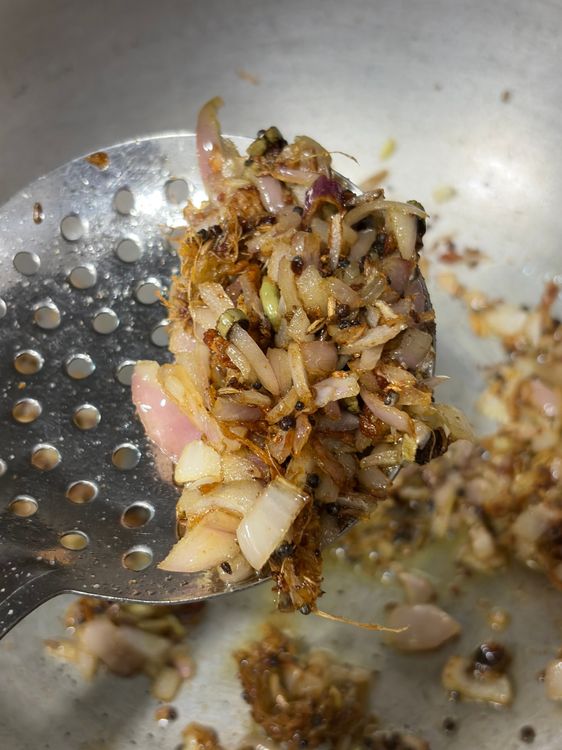 Step 2.2: Add onions and cook until soft and lightly golden