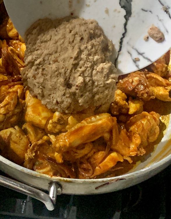Step 2.1: Mix the ground paste well until the spices coat the chicken