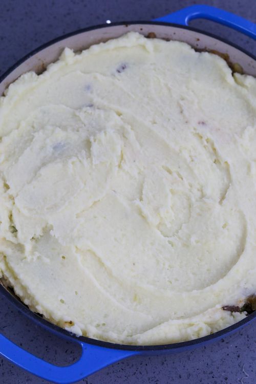 Step 3.1: Using a spoon or spatula, spread the mashed potatoes on top and bake for 40-45 minutes or until the potatoes have turned golden brown