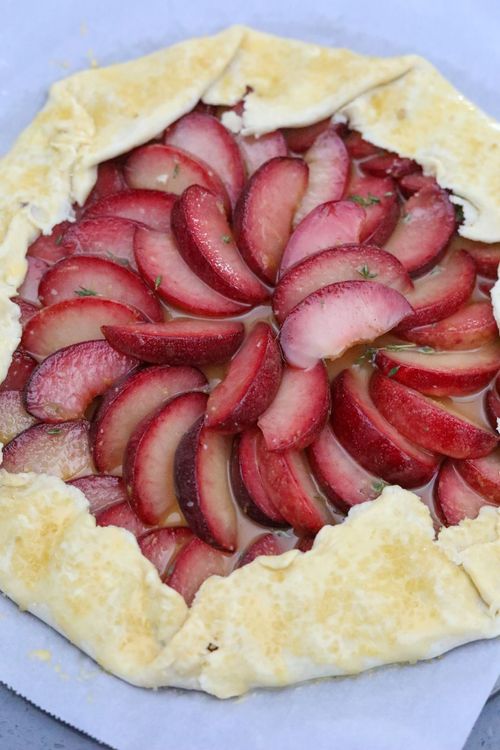 Step 2.1: Fold the remaining crust over the ends of the fruit