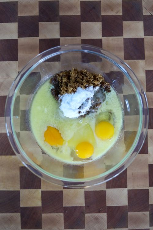 Step 3.1: In another bowl, whisk the melted butter, sugar, eggs, and bourbon