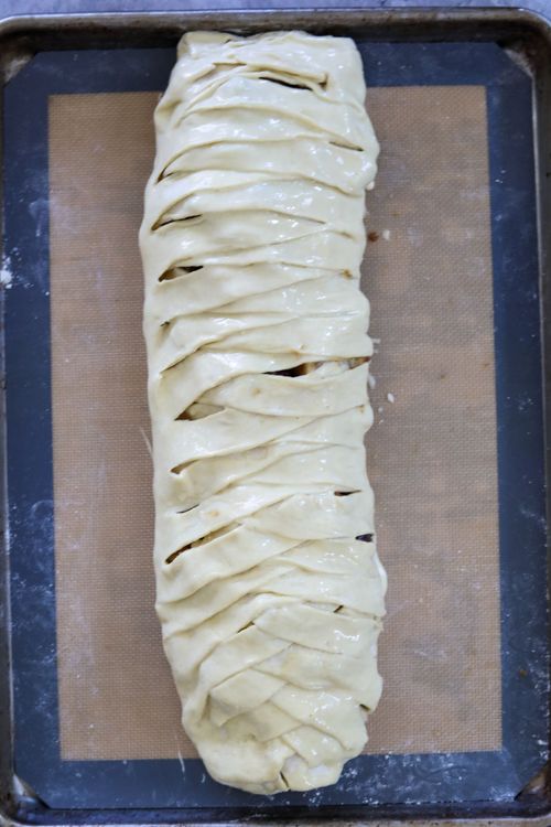 Step 1.1: Cut inch-long strips on each side of the line of apples and cranberries
