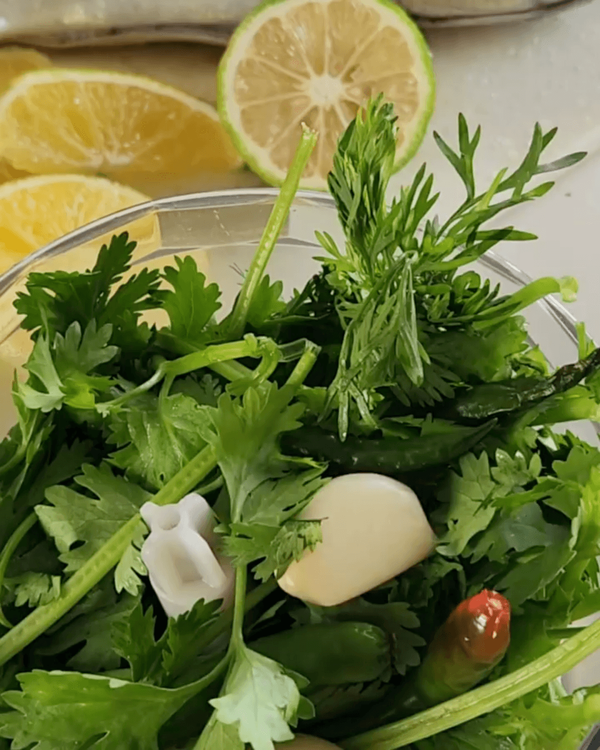 Step 2.1: Coarsely blend coriander (leaves and stems), garlic, green chillies, and green capsicum