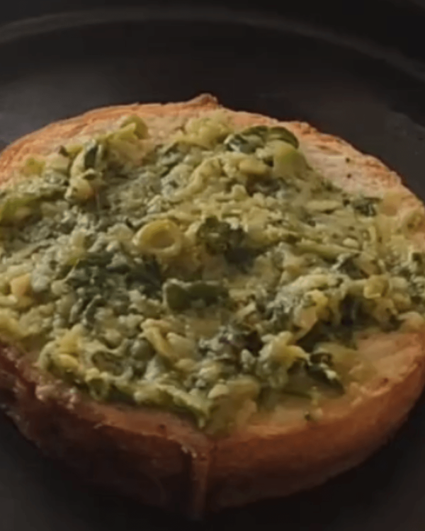 Step 3.1: Spread a thin layer of pea-basil pesto on each slice of toasted barrel bread