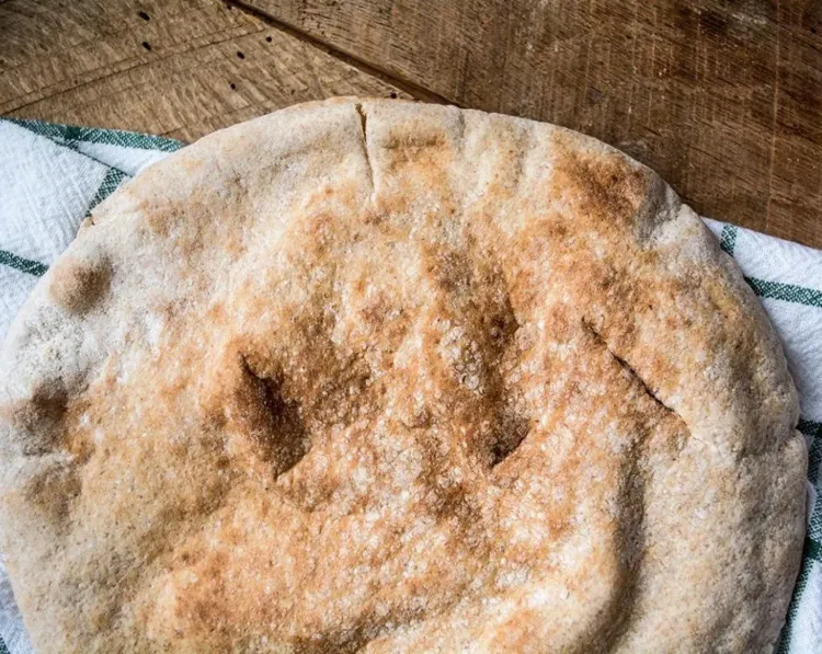 Step 3.1: Put the whole wheat pita bread on a pan and bake them in the oven for 7-10 minutes to make them crispy