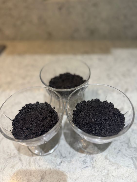 Step 1.1: Press the butter biscuit mixture into your chosen cheesecake containers and refrigerate while making the 2 fillings