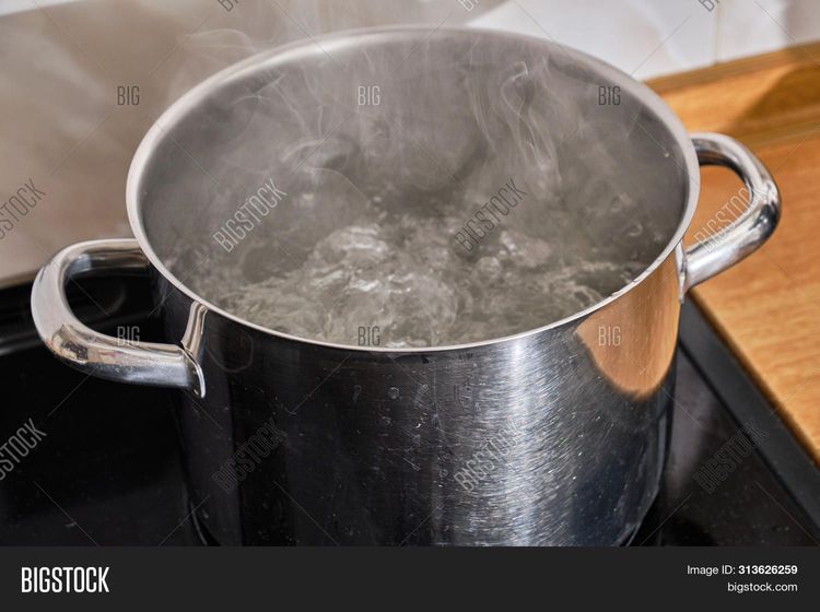 Step 2.1: In a saucepan, bring water to a boil