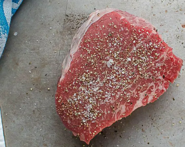 Step 2.1: Season both sides of the steaks with kosher salt and ground black pepper