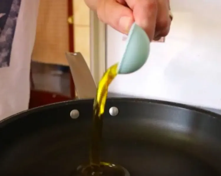 Step 2.1: Heat a nonstick frying pan over medium heat and add olive oil