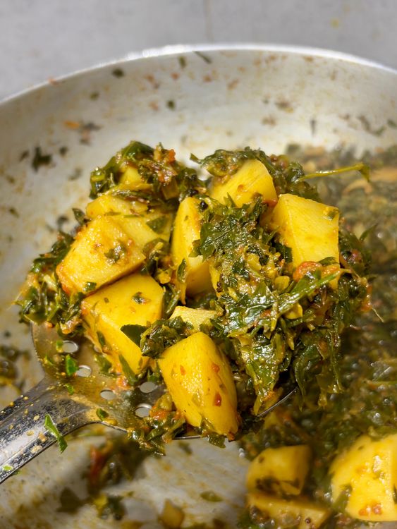 Step 3.2: Add the chopped methi leaves and mix gently