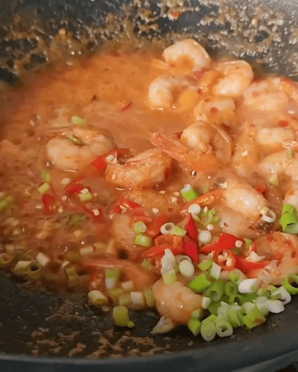 Step 1.1: Add chopped spring onion and remove from heat