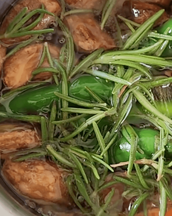 Step 1.1: Add whole green chillies, a medium jalapeño pepper, and a few sprigs of rosemary