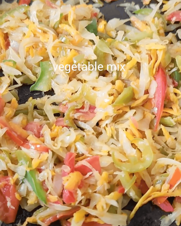 Step 1.1: Add grated carrots, red pepper, and green pepper