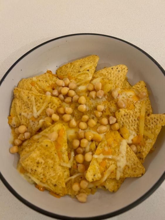 Step 3.1: Layer chickpeas or black beans over the melted cheese