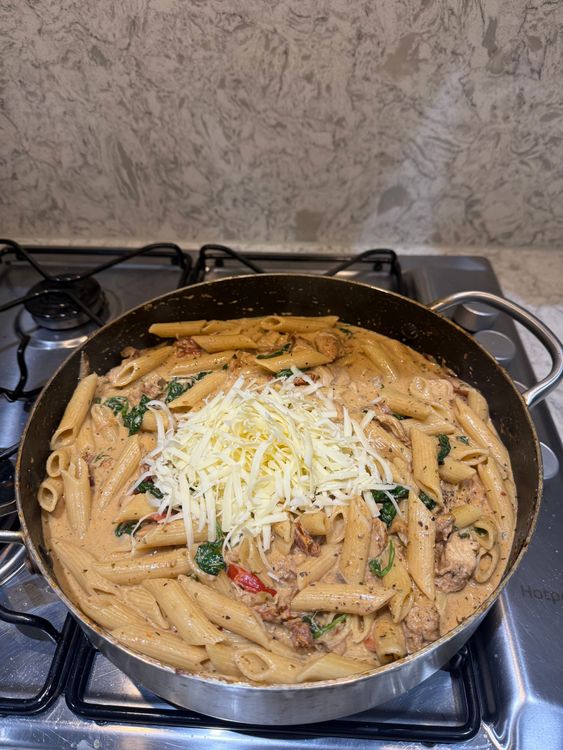 Step 3.1: Turn off the heat, add shredded cheese, and stir until melted and creamy
