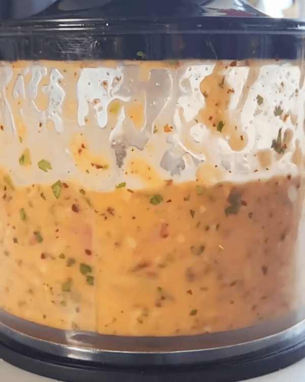 Step 1.1: Gradually add ¾ cup of oil while blending