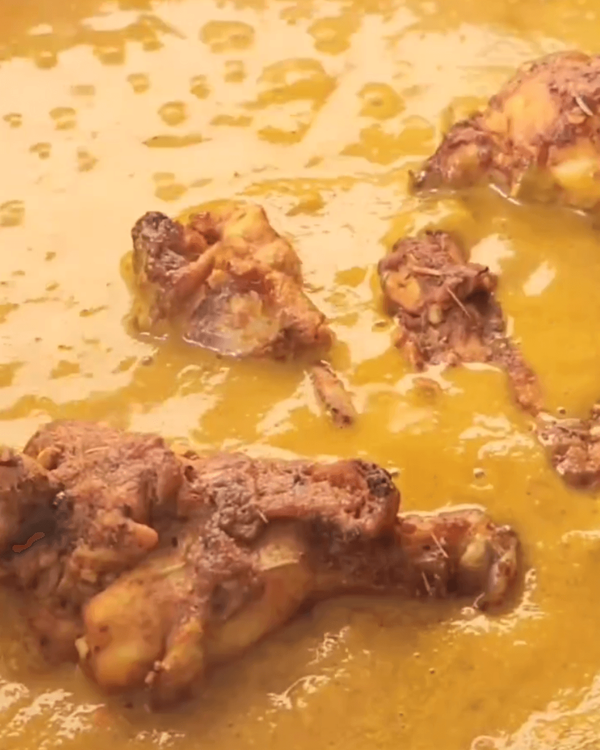 Step 3.1: Once the sauce is ready, quickly dip each grilled chicken piece in the sauce to coat, then transfer to a serving plate