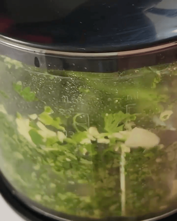 Step 2.2: Coarsely blend coriander (leaves and stems), garlic, green chillies, and green capsicum