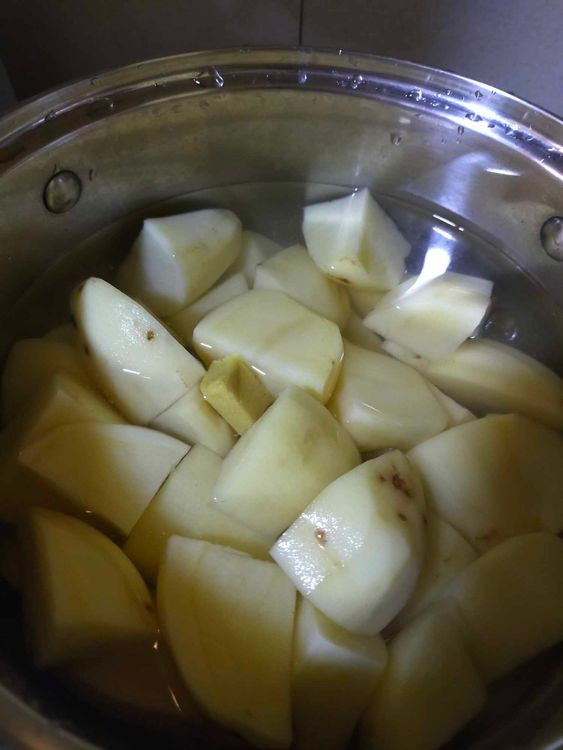 Step 1.1: Boil the potatoes in a pot of water (or stock) with a pinch of salt and half a chicken bouillon cube for about 10 minutes over medium-high heat or until tender