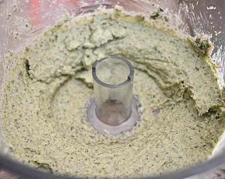 Step 1.1: Keep the processor running while you slowly pour in the olive oil until you have a smooth sauce