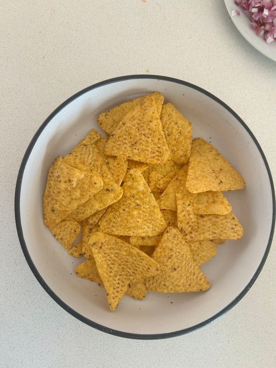 Step 3.1: Spread the corn chips evenly on a microwave-safe plate
