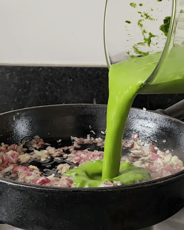 Step 1.1: Add the blended mixture to your sautéed onion and garlic and stir to combine